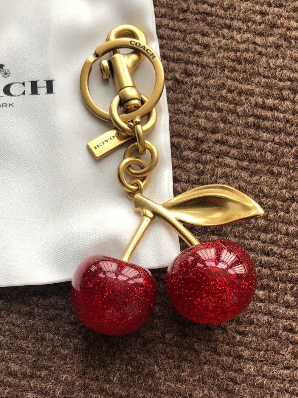Coach Gold-Tone Cherry Key Charm with Red Glitter